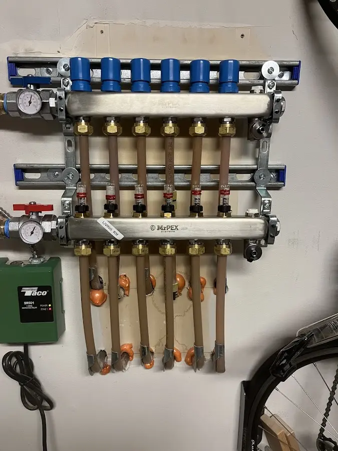 Plumber performing Leak Detection at a residential property in Painesville